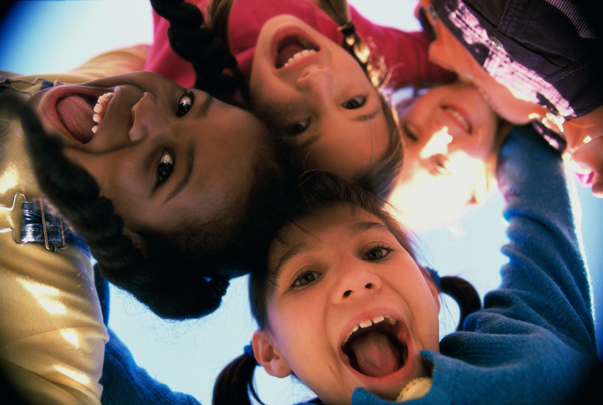 portrait of children looking down into the camera